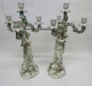 Pair of late 19th century Sitzendorf candelabra, both modelled as maidens supporting a central