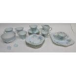 Group of Shelley tea wares in pattern number 13052, decorated with a floral print in light blue,