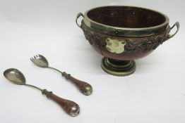 Silver plated mounted and oak two-handled pedestal salad bowl together with a pair of servers,