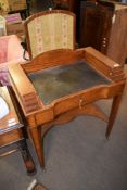 19th century mahogany cross banded small desk, having a stepped raised pediment which is fitted on