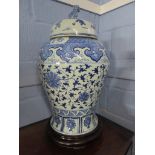 Large Chinese porcelain jar and cover, the baluster body decorated with a floral design, the cover