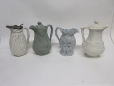 Group of four 19th century relief moulded jugs including one of a drunken Silenius jug and three