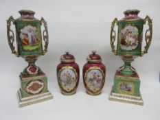 Group of Continental porcelain wares including a pair of vases with covers and decorated with