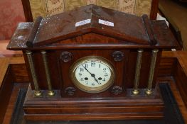 Victorian mahogany stained mantel clock of colonnade form, 41cm wide