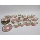 Group of late 19th century Minton coffee cups and saucers decorated in a pink and gilt design,