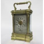 Late 19th century French repeating large carriage clock in lacquered brass case, 17cm high