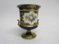 Royal Crown Derby vase with a central spray of flowers on a gilt ground with gilt decoration (