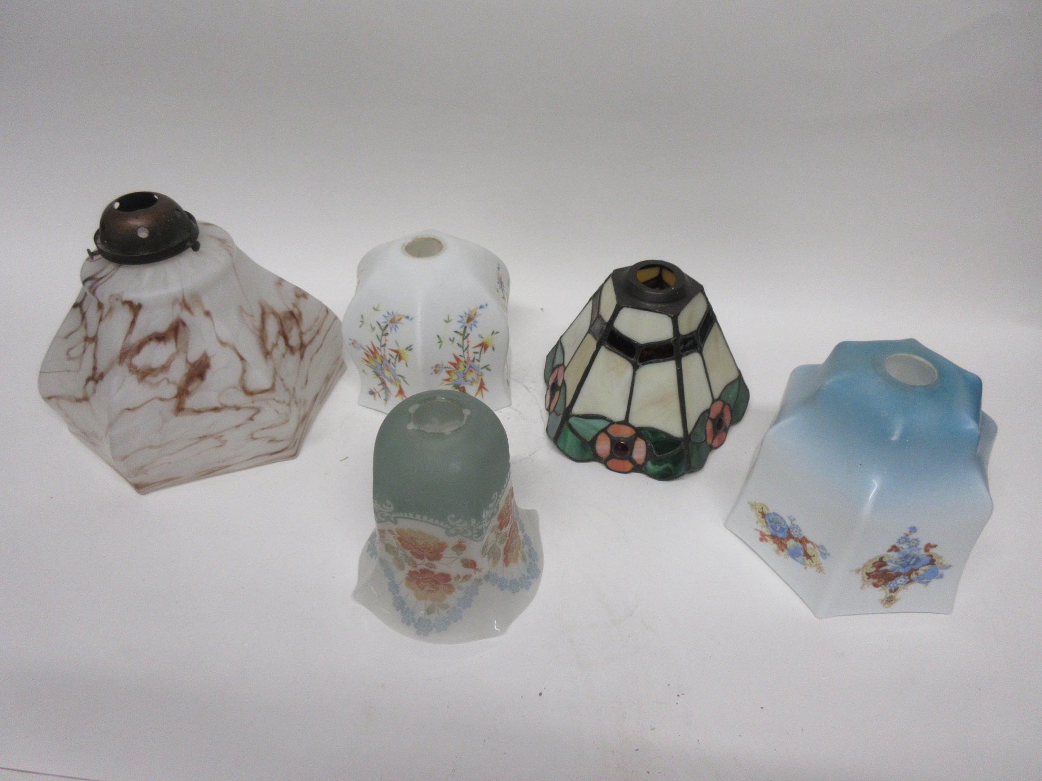 Group of five oil lamp shades, various sizes, one in Art Nouveau style with floral decoration