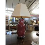 Chinese sang de beouf vase on wooden base converted to a table lamp