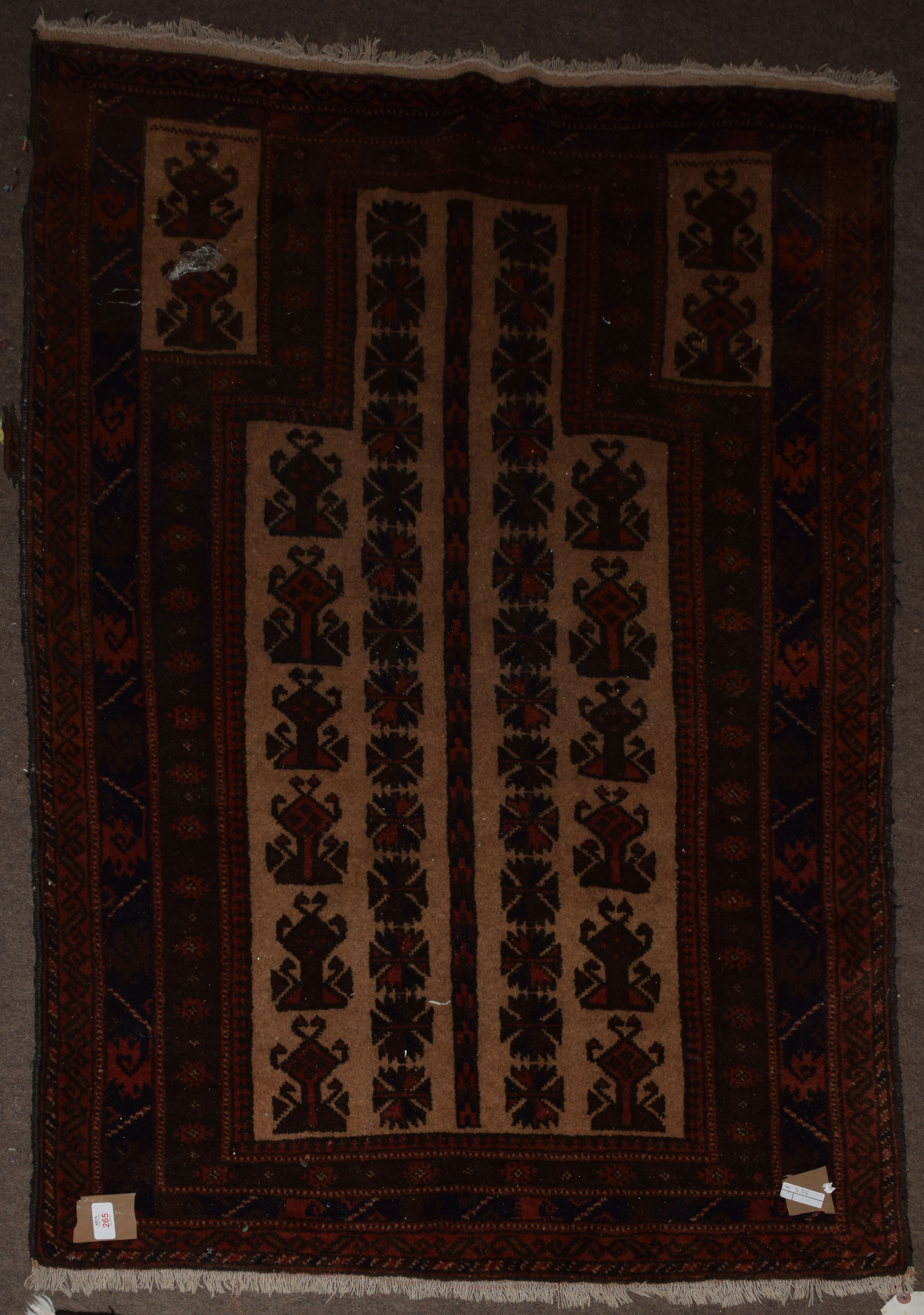 Small Caucasian rug, triple gull border, central geometric panel, mainly rust and beige field, 90