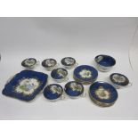 Part Crescent china tea set by George Jones, the mottled blue ground decorated with birds in