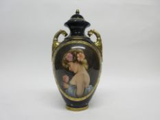 Late 19th century Vienna style porcelain vase and cover, the blue ground with gilt bordered oval