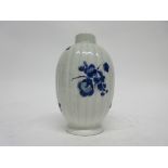 18th century Worcester porcelain tea canister of ribbed form decorated with dry blue flowers, 13cm