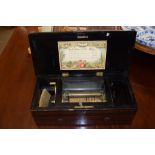 Late 19th century rosewood and ebonised cased music box with cylinder movement (7 teeth missing),