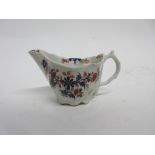 Lowestoft porcelain jug of Chelsea ewer type decorated in Redgrave style with a floral pattern and