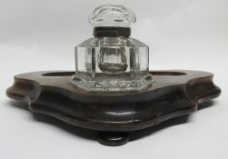 Victorian walnut triangular large ink stand, fitted with heavy glass inkwell, 42cm wide