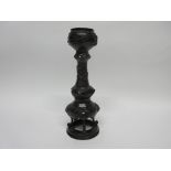 Oriental bronze candlestick with applied decoration of turtles and dragons, 31cm high