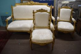 Louis quinze style giltwood suite comprising a three-seater sofa and pair of armchairs