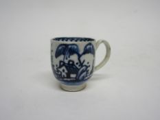 Miniature English porcelain cup with blue and white design, probably Liverpool, 3cm high