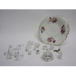 Porcelain plate and a group of Swarovski glass figures including a puffer fish, a poodle, and others