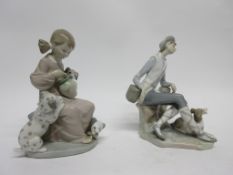 Lladro model of a young girl with puppies together with a Lladro model of a swan (2)