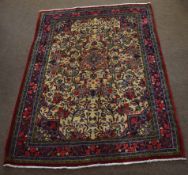 Modern caucasian rug with multi gull boarder, central panel of floral designs mainly off white and