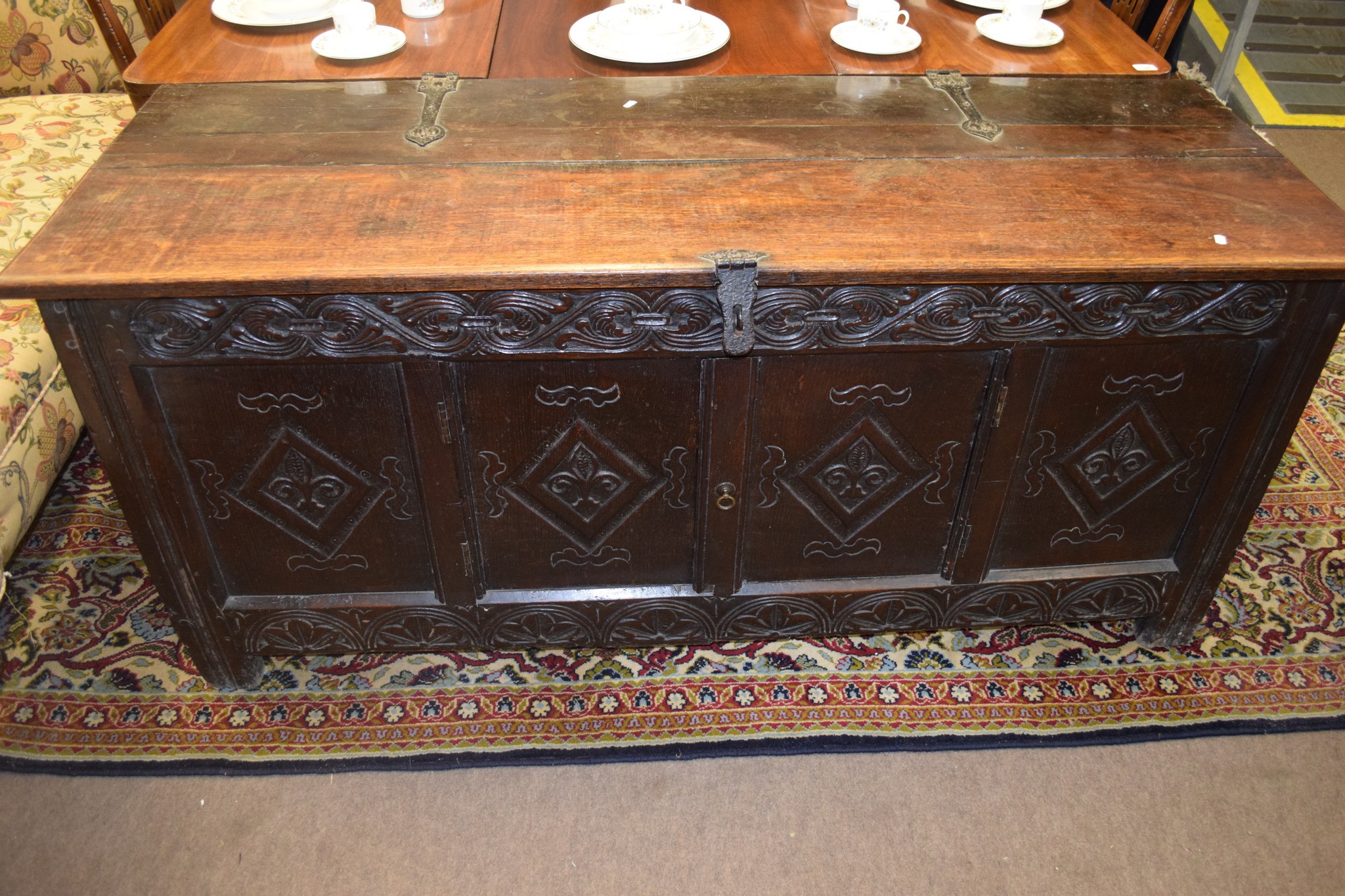 18th century oak coffer, four panelled front on plain stile feet, 166cm wide