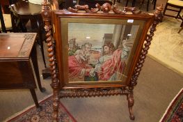 Victorian walnut large fire screen, central grospoint wool embroidered panel depicting a Biblical