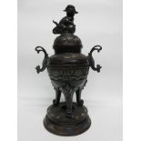 Large metal bronzed jar and cover with lion finial, decorated in cloisonne style, standing on