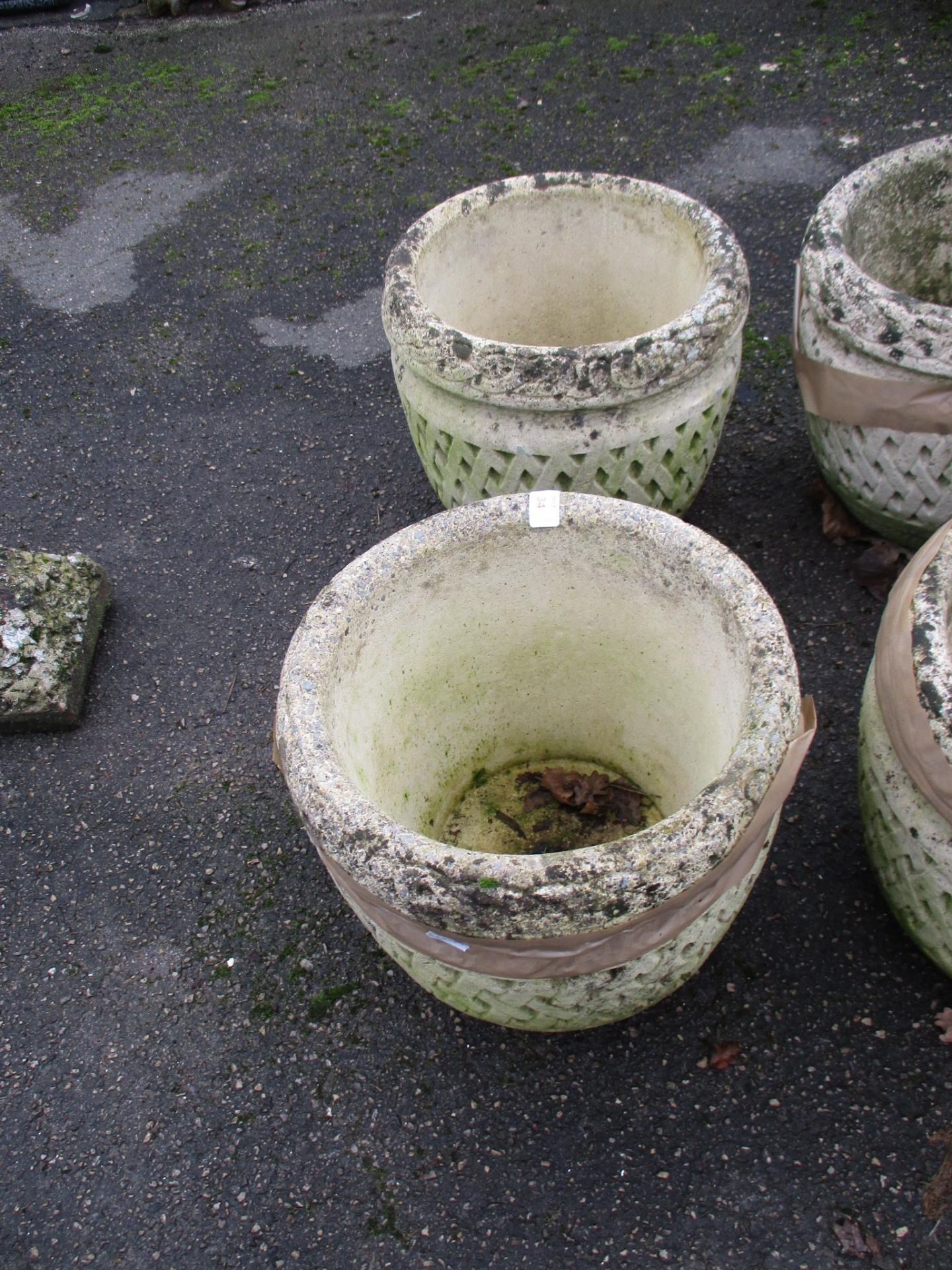 PAIR OF CIRCULAR MOULDED PLANTERS, EACH DIAM APPROX 34CM