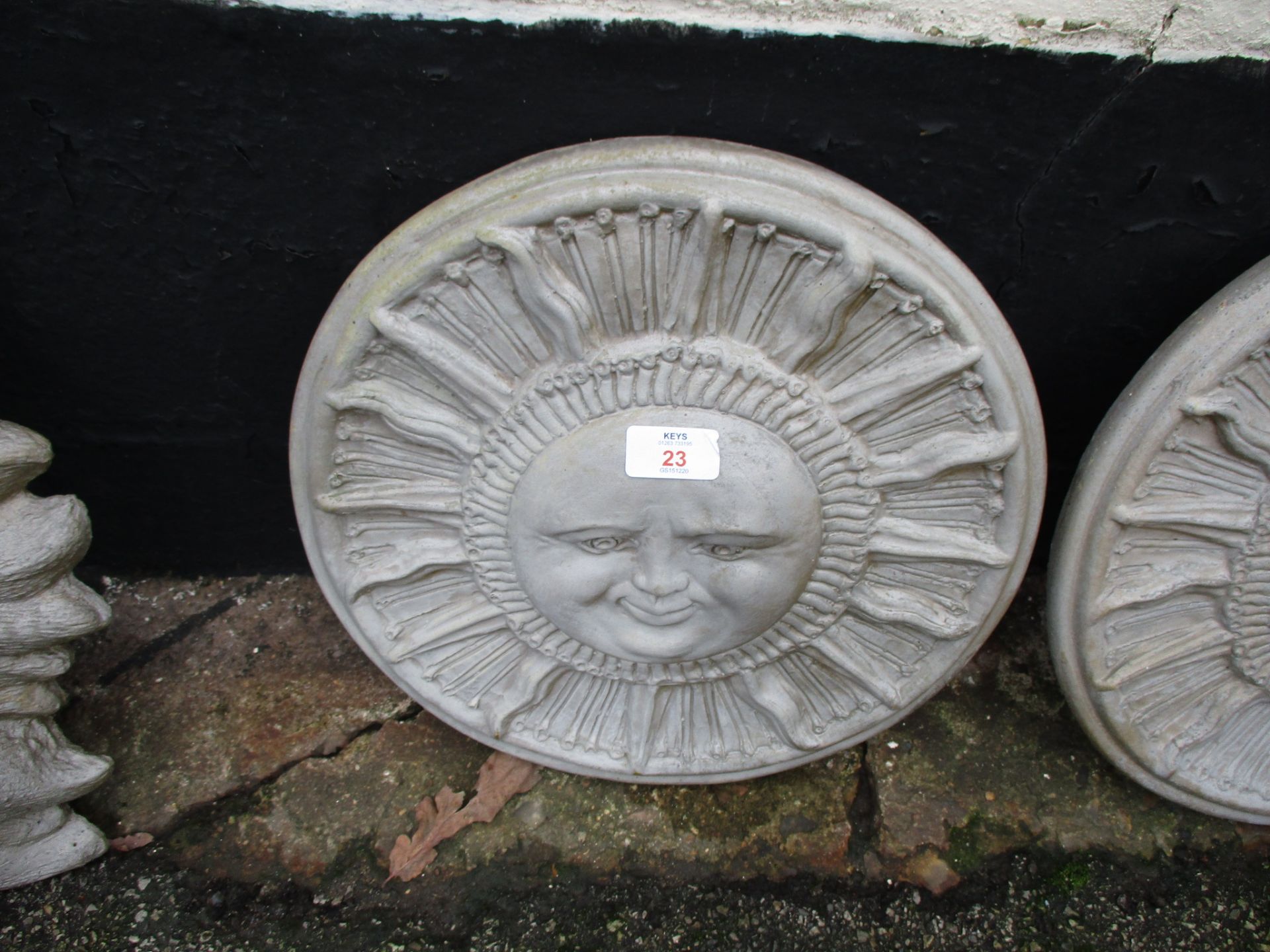 COMPOSITION WALL PLAQUE DEPICTING THE SUN, 36CM DIAM