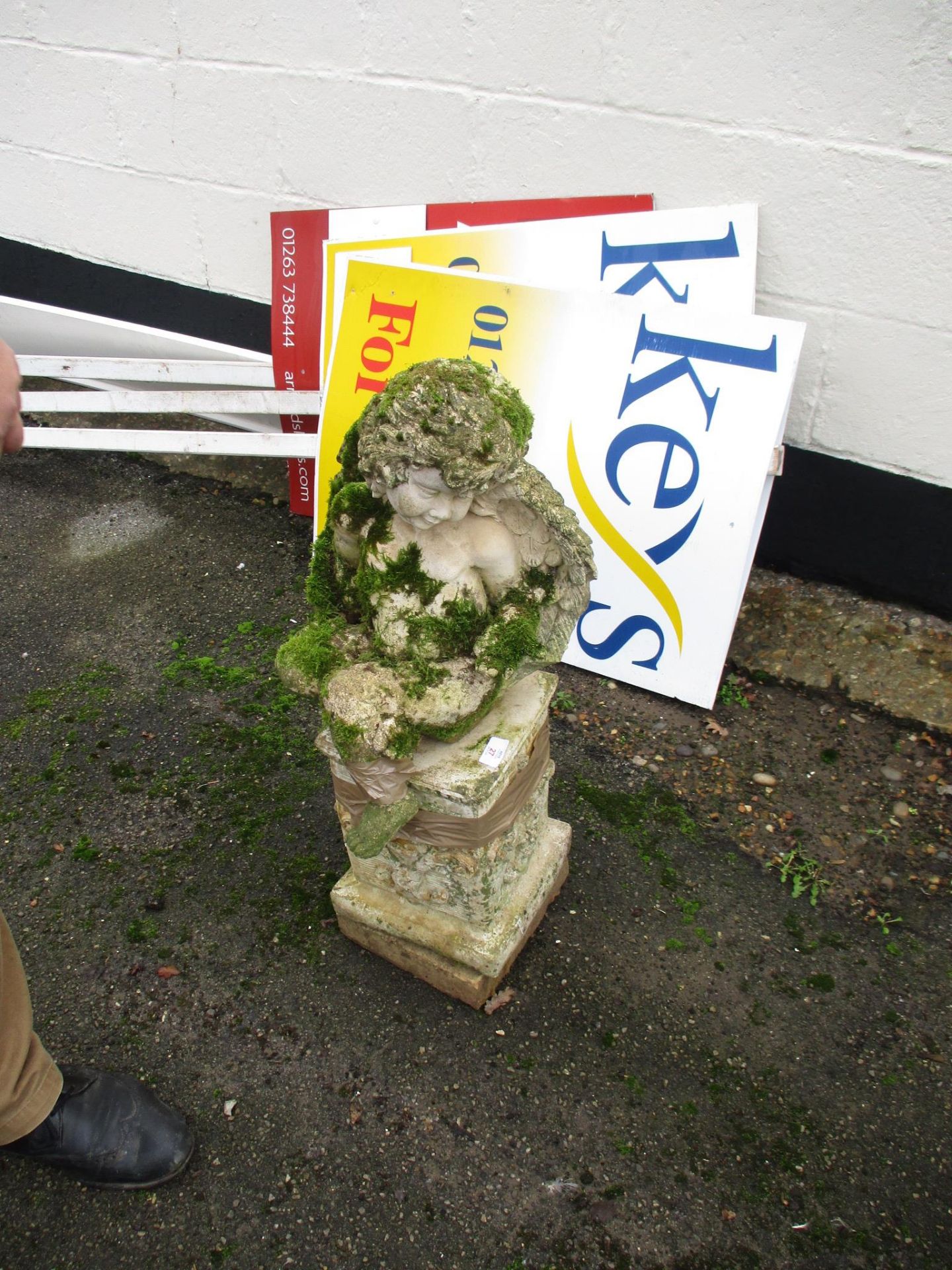 FIGURE OF A CHERUB ATOP A PLINTH, TOTAL HEIGHT APPROX 79CM