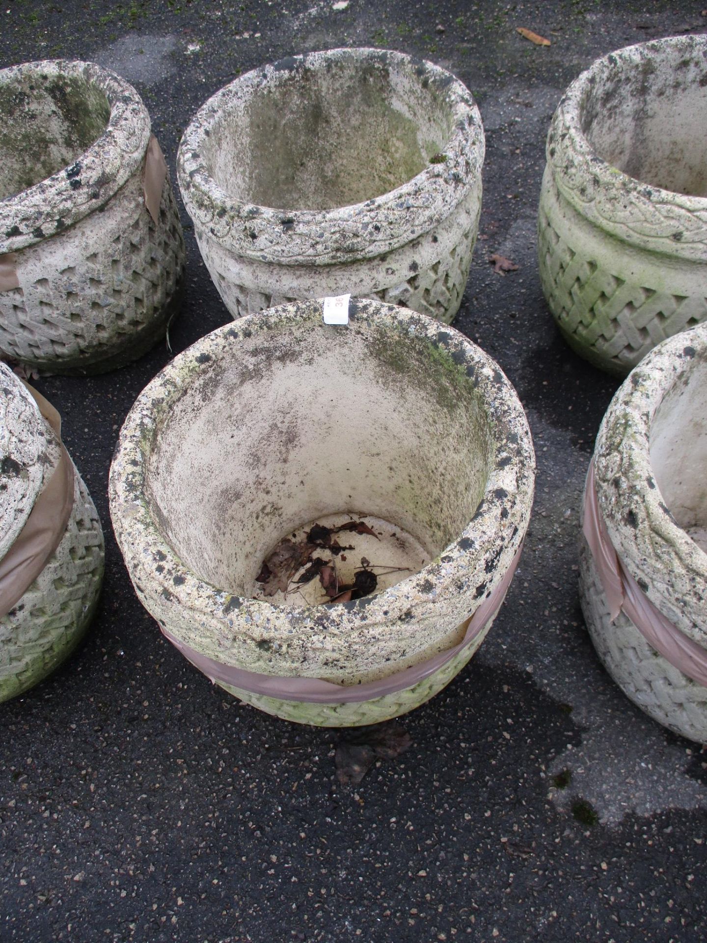 PAIR OF CIRCULAR MOULDED PLANTERS, EACH DIAM APPROX 34CM