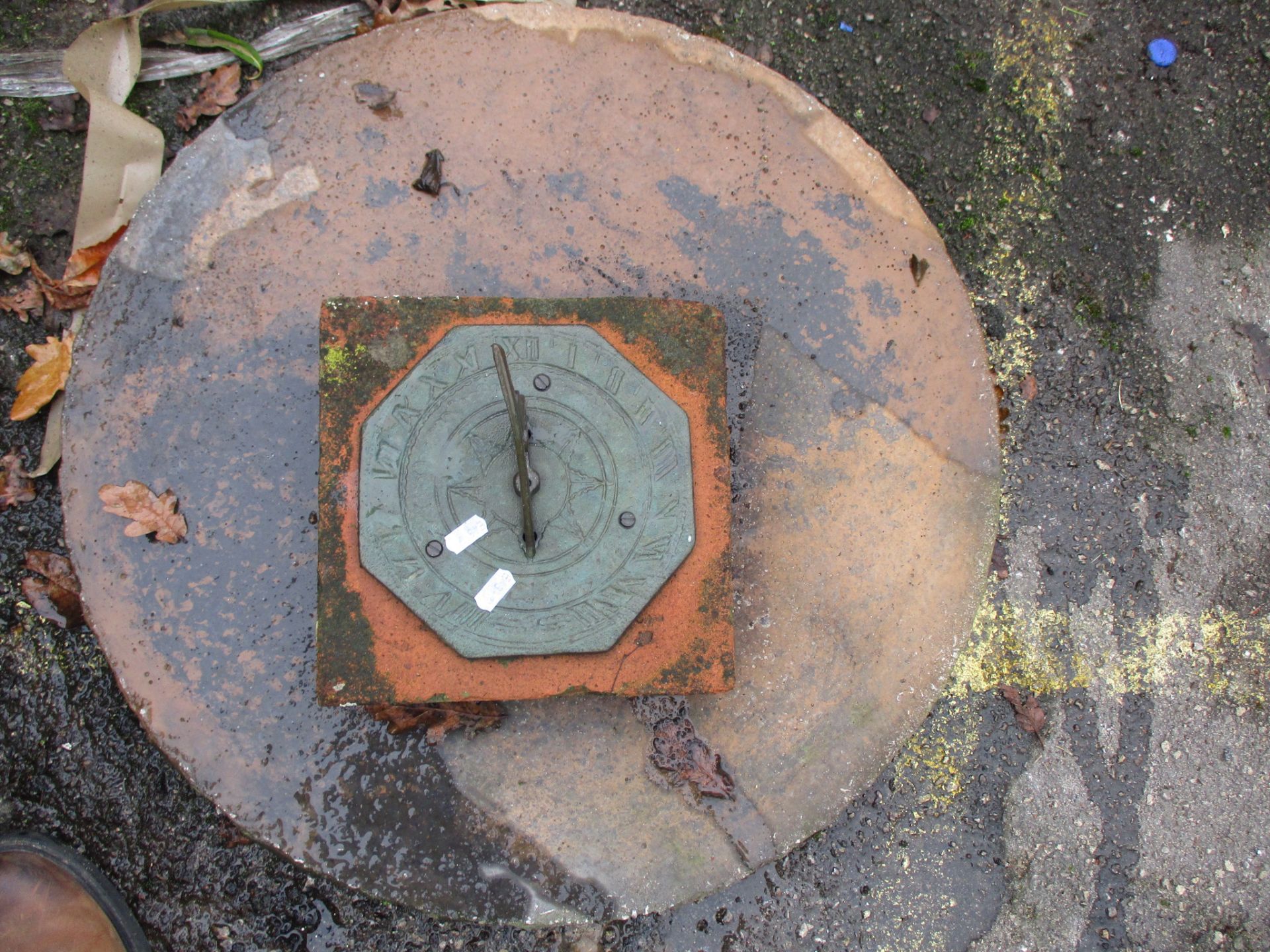 SUNDIAL MOUNTED ON TERRACOTTA TOGETHER WITH A MOULDED TABLE TOP, WIDTH APPROX 59CM