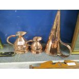 GRADUATED SET OF COPPER JUGS