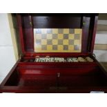 BOX CONTAINING GAMES AND A WOODEN CHESS BOARD INCLUDING DOMINOES AND DRAUGHTS