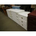 PAIR OF WHITE MELAMINE THREE DRAWER CHESTS AND A FURTHER THREE DRAWER BEDSIDE CHEST (3)