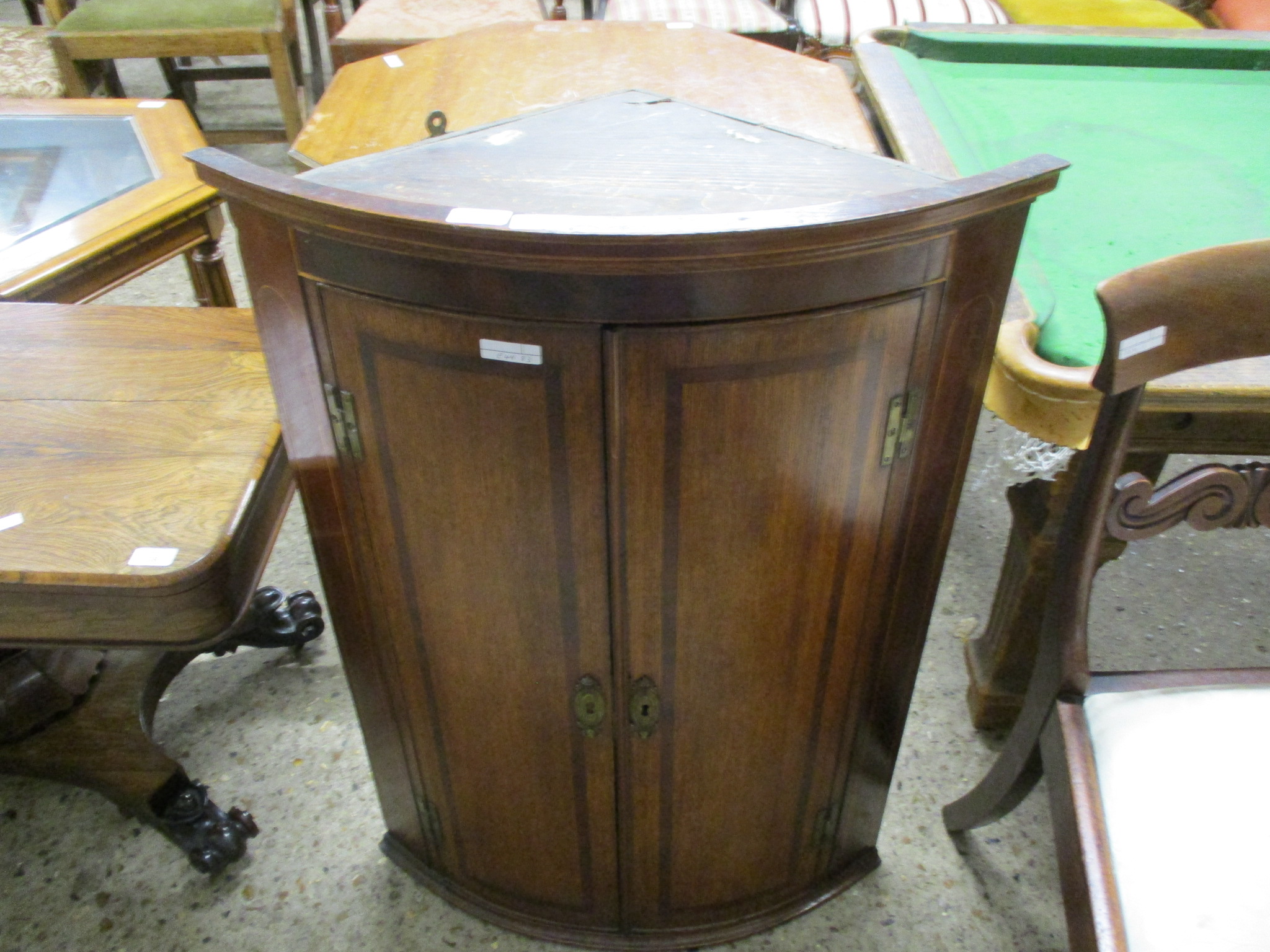 EARLY 19TH CENTURY OAK BOW FRONTED WALL MOUNTING CORNER CUPBOARD, 67CM WIDE