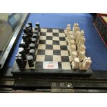 SMALL CHESS BOARD WITH ISLE OF MAN TYPE CHESS PIECES