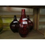 TWO MODERN CRANBERRY GLASS SPILL VASES AND ONE OTHER