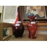 RUBY GLASS SPILL VASE AND A TWO-HANDLED CRANBERRY GLASS VASE