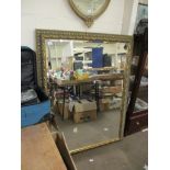 LARGE GILT FRAMED RECTANGULAR WALL MIRROR, 105CM WIDE