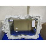 MIRROR IN SHAPED WHITE FRAME