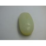 Carved Chinese jade pebble with makers mark in red 5.5 cm