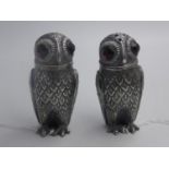 Pair of unusual condiments in the form of owls with glass eyes