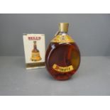 Boxed pottery bottle of Bells whisky (seal intact) 18.75cl 40% together with a bottle of Haig Dimple