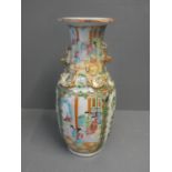 Canton vase with dog of fo handles, decorated with naturalistic panels alternating with scenes of