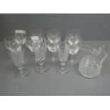 8 Ribbed wine glasses, 3 cut glass liquor glasses & glass jug