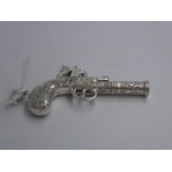 Silver whistle in the form of a gun