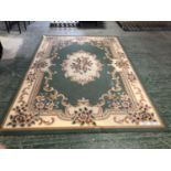 Modern Chinese style rug in Bercion Fitre with a green ground 240 x 340 cm